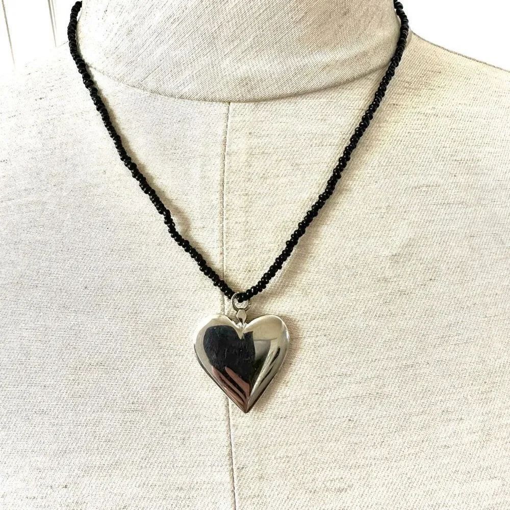 Silver tone heart pendant black beaded necklace